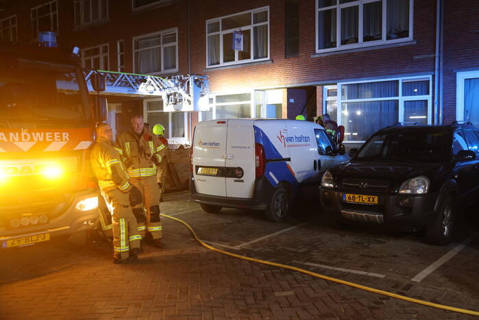 Brand in portiekwoning snel geblust