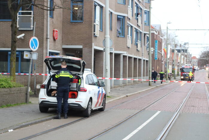 Stoel in woning vliegt in brand