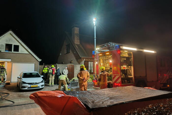 Schoorsteen geveegd na brand