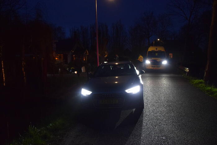 Persoon uit te water geraakte brommobiel gered