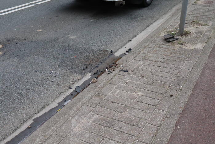 Flinke schade en lekkage na kop-staart botsing