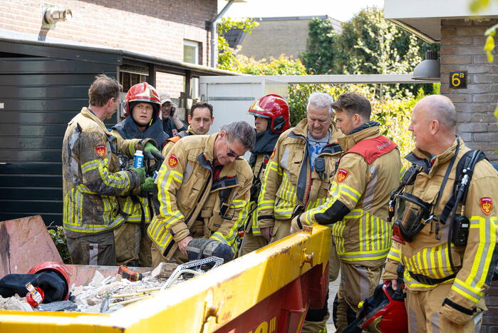 Klusjesmannen blussen brand in woning
