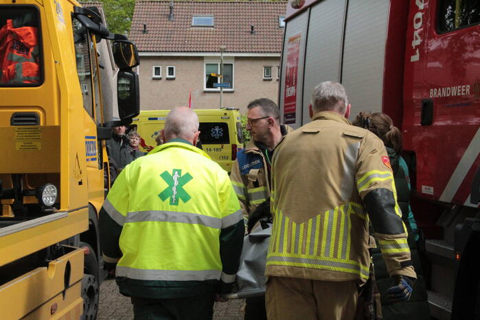 Hond gered door brandweer bij woningbrand