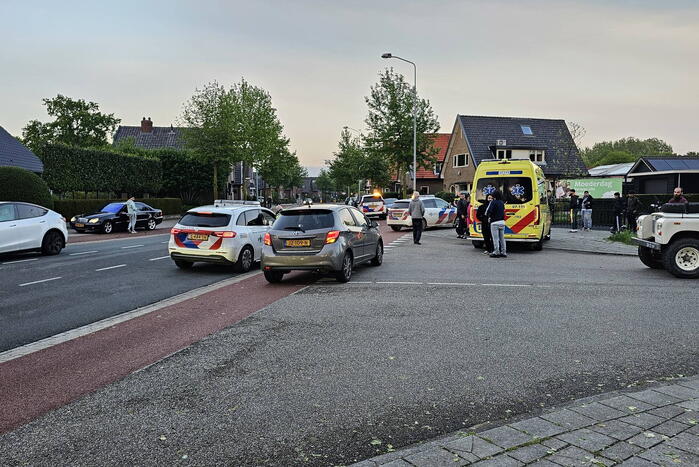 Scooterrijder en automobilist in botsing