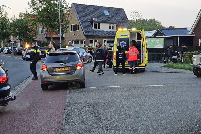 Scooterrijder en automobilist in botsing