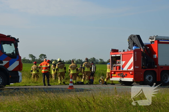 Hulpdiensten groots ingezet voor voertuig te water