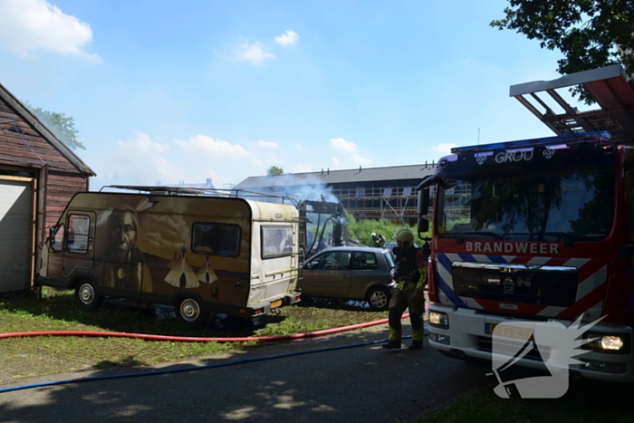 Uitslaande brand in grote loods
