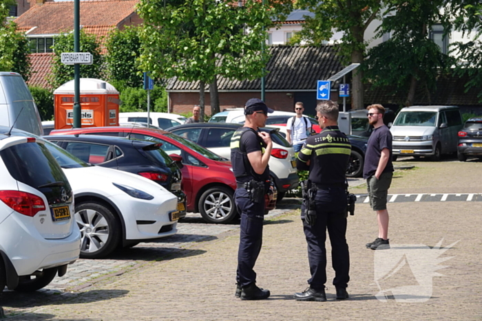 Kortsluiting onder motorkop zorgt voor brand