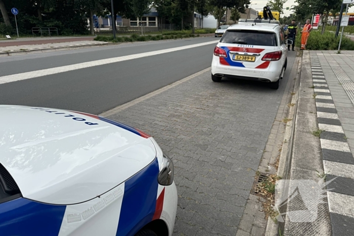 Politieauto zwaar beschadigd door botsing