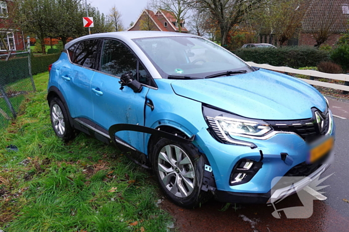 Auto ramt hekwerk kapot