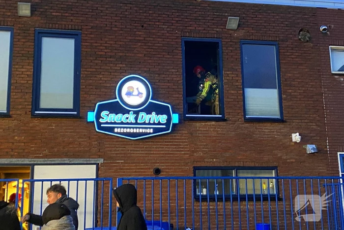 Brand in keuken van bezorg restaurant