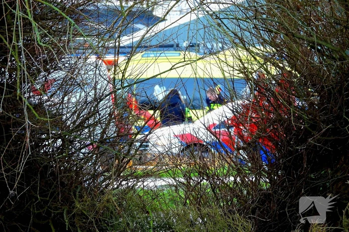 Persoon bekneld op boeren terrein
