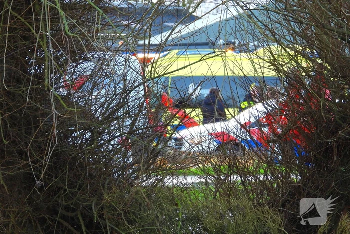 Persoon bekneld op boeren terrein