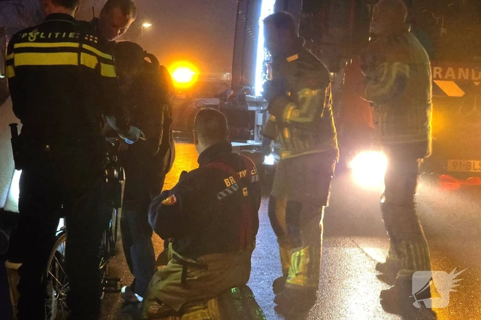 Kindje vast met voet tussen spaken