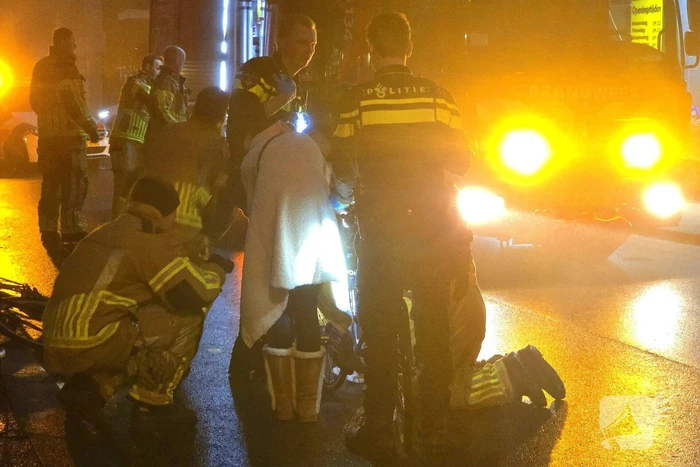 Kindje vast met voet tussen spaken