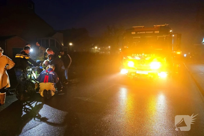 Kindje vast met voet tussen spaken