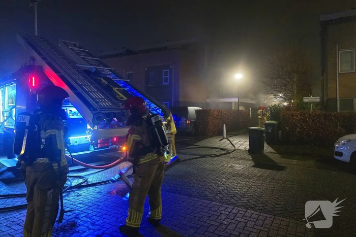 Brand in garage van woning