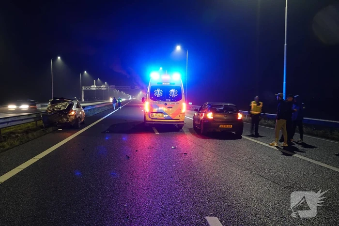 Auto var vlam na aanrijding