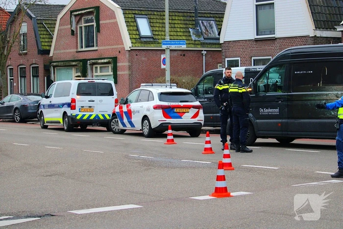 Schade na botsing tussen personenauto en bestelbus