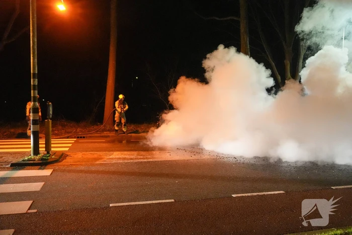 Scooter rijdend in brand gevlogen