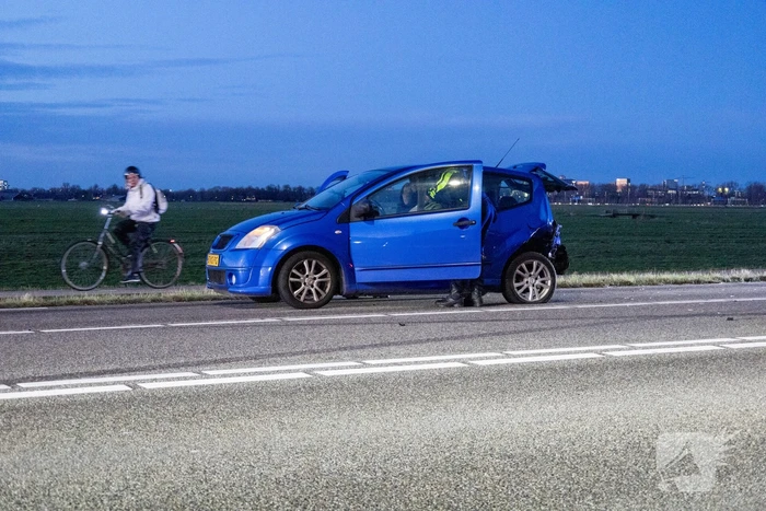 Auto te water na botsing
