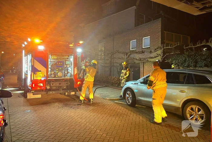 Brand in garage van woning