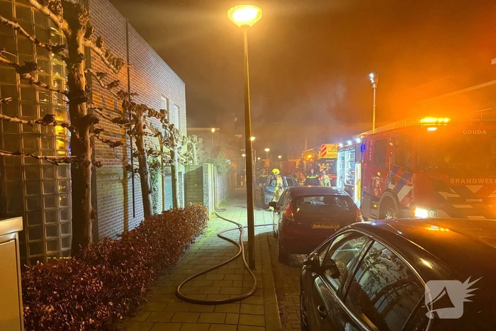 Brand in garage van woning