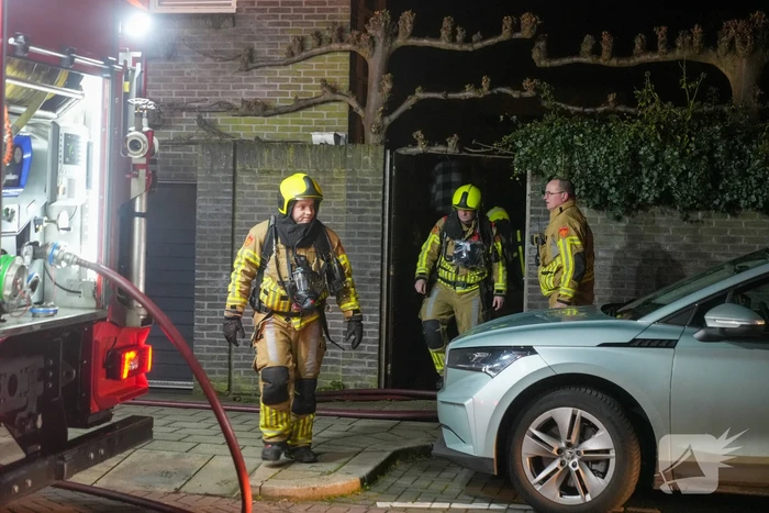 Brand in garage van woning