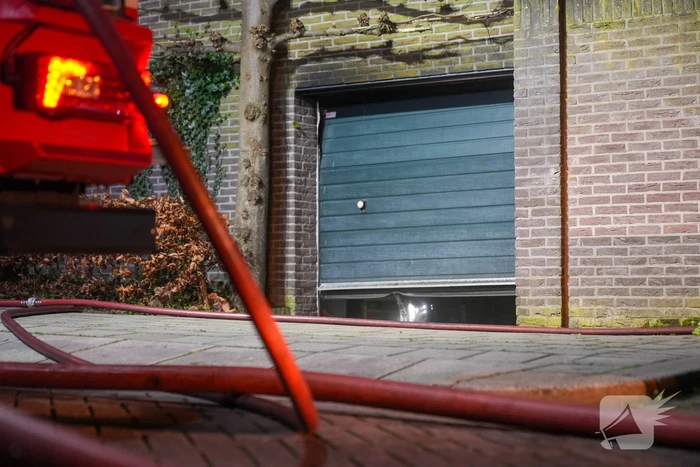 Brand in garage van woning