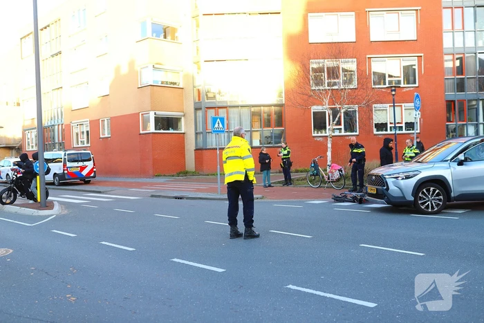 Fietser onderuit na aanrijding