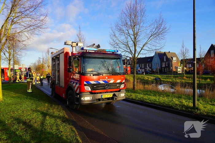 Auto te water na aanrijding