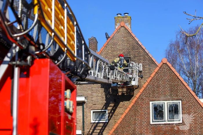 Flinke rookontwikkeling bij brand in hoekwoning