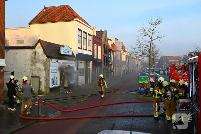 Flinke rookontwikkeling bij brand in winkel