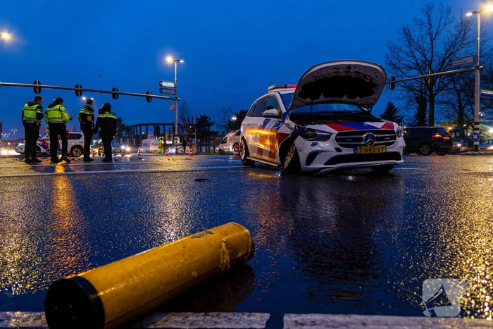 Forse schade na ongeval met politieauto