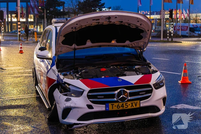 Forse schade na ongeval met politieauto