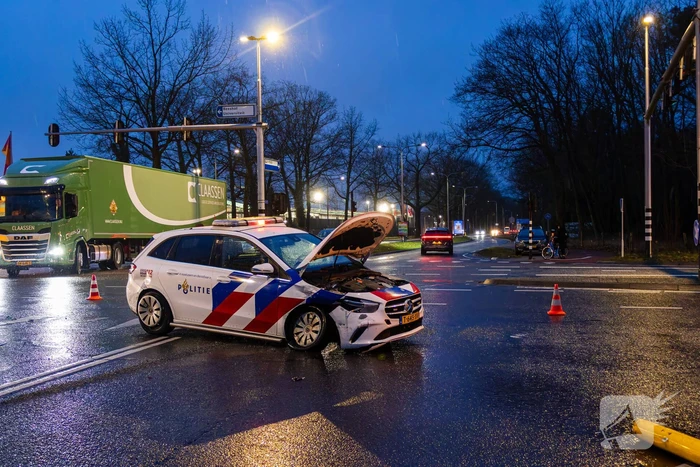 Forse schade na ongeval met politieauto