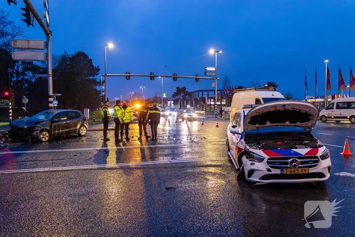 Forse schade na ongeval met politieauto