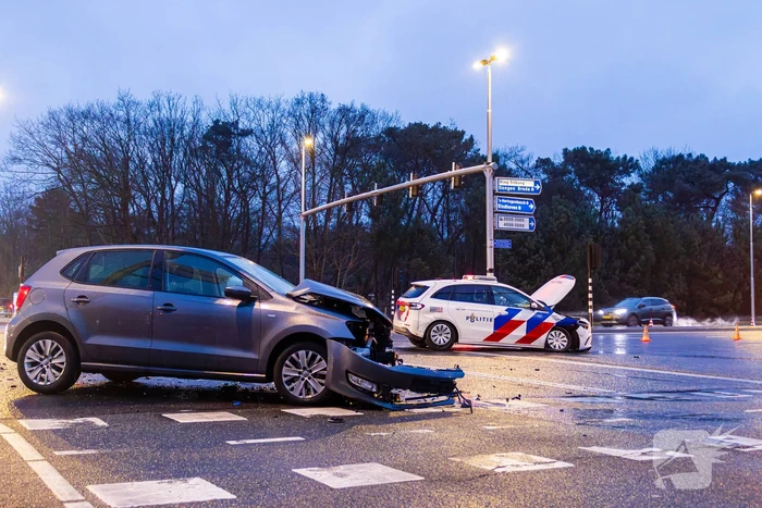 Forse schade na ongeval met politieauto