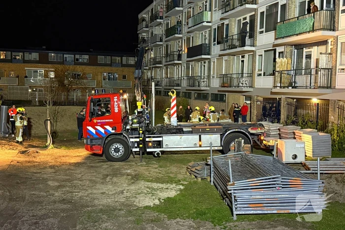 Kind bekneld onder pallet stenen