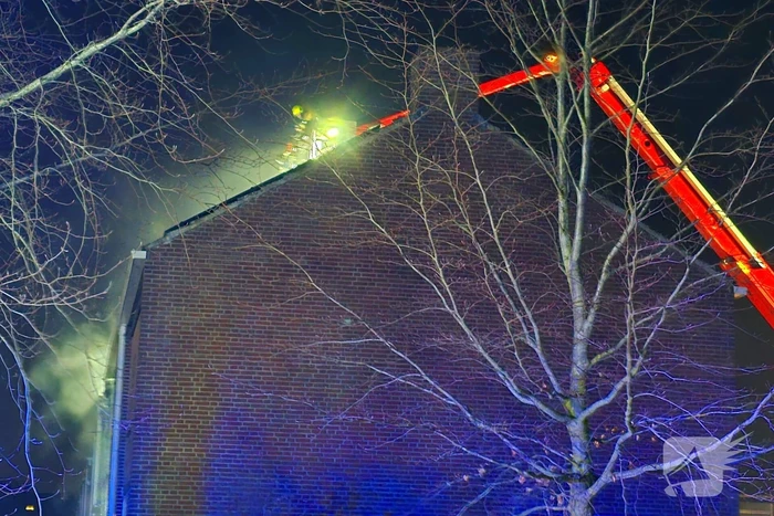 Grote uitslaande brand in woning