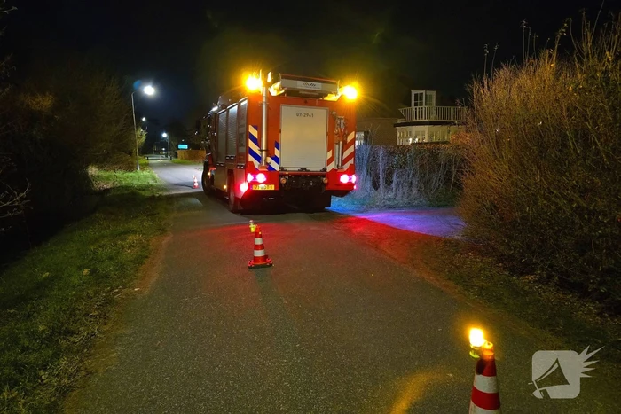 Brandweer bevrijdt duif uit schoorsteen