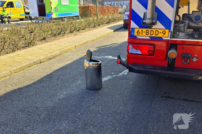 Melding van brand in portiekwoning