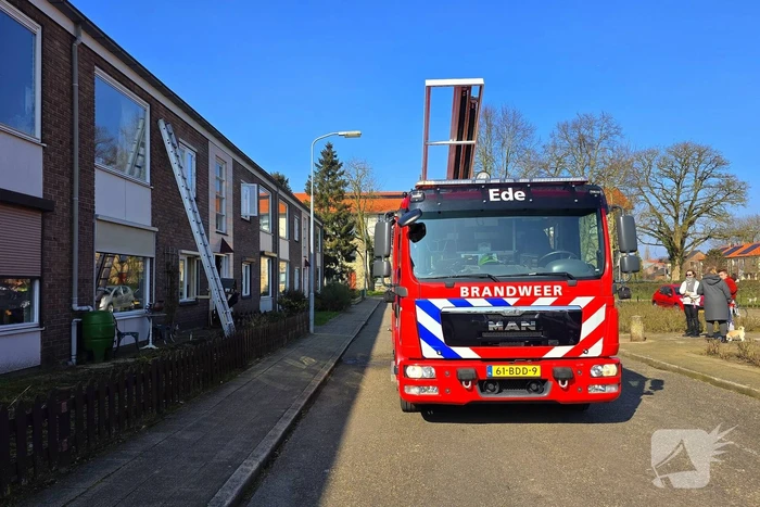 Melding van brand in portiekwoning