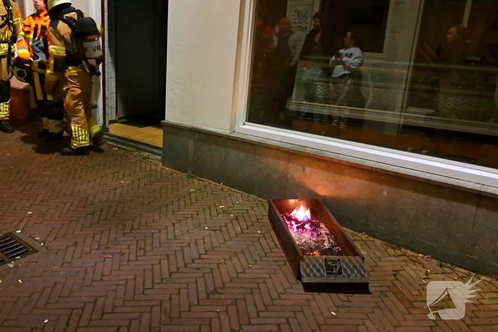 Brandweer ingezet voor brandende rookkast