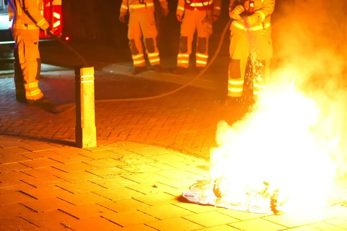 Containers en afval in brand