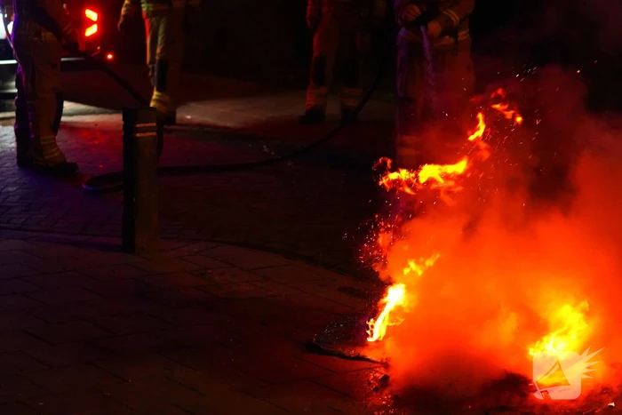 Containers en afval in brand