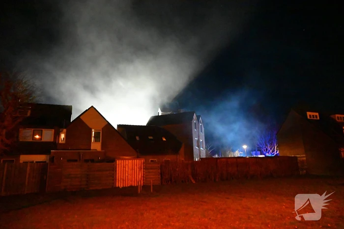 Persoon gered uit brandende woning