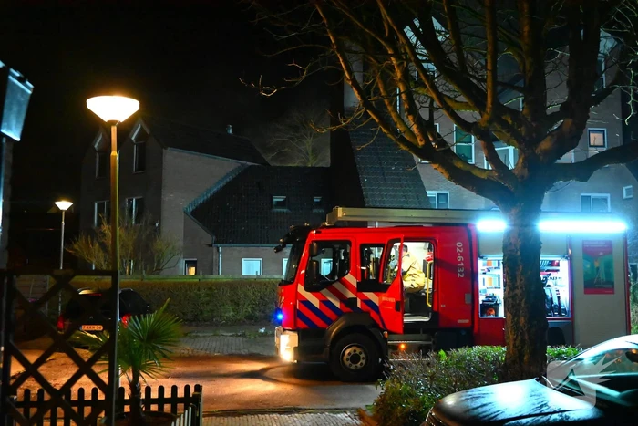 Persoon gered uit brandende woning