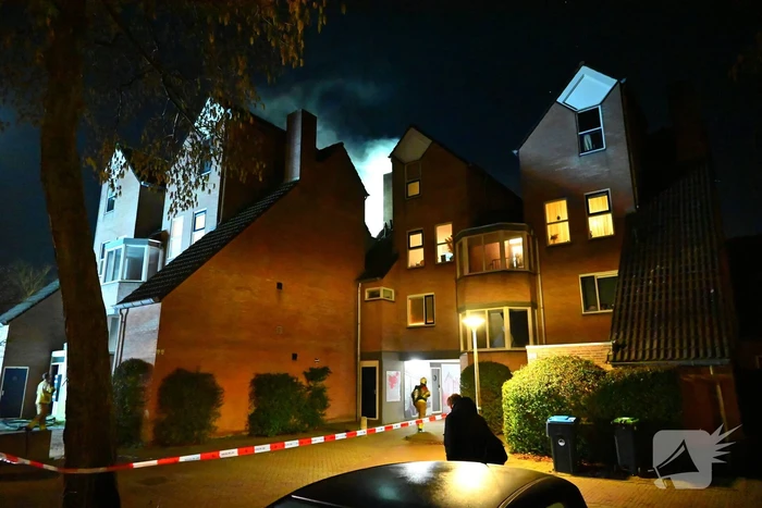 Persoon gered uit brandende woning
