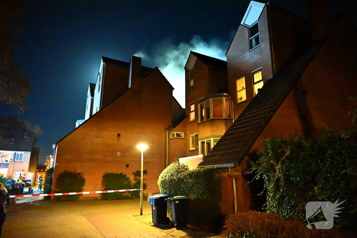 Persoon gered uit brandende woning